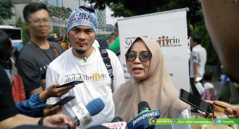 Dwi Siti Rhomdoni (Dwiki, kiri) dan Agus Kurnia (kanan), Penyintas Dalam Kegiatan Peringatan 3 Tahun Bom Thamrin, Minggu, (13/01/2019)